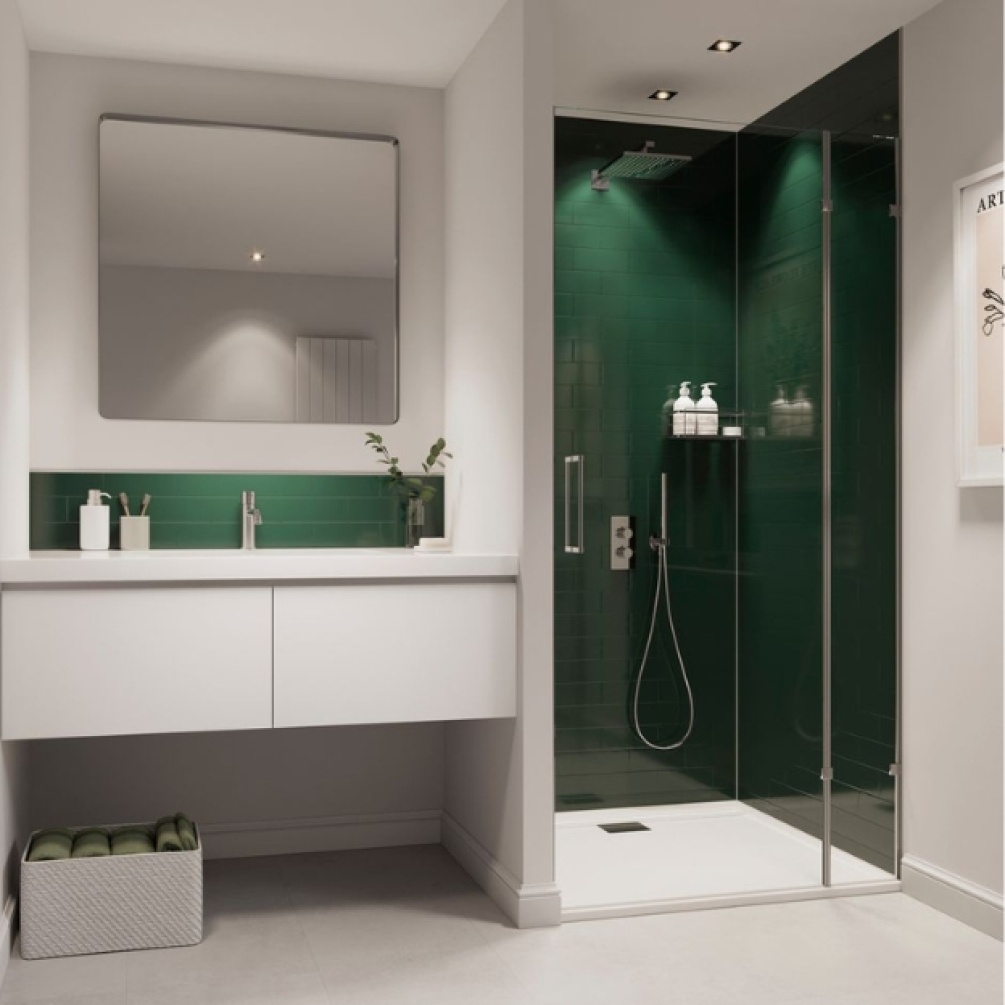Lifestyle image of the Showerwall Compact Hunter Green 2440mm x 1220mm Tile Effect Wall Panel - SWCT04 within a shower cubicle and above a wall-hung vanity unit with mirror